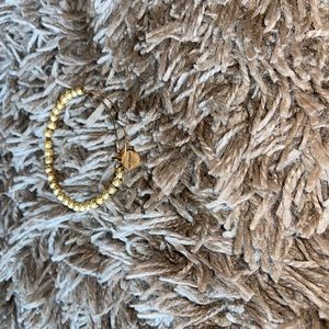 Gold Alex and Ani bracelet